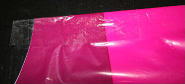 grembiulino-delantal con bolsas de plástico