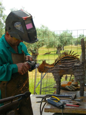 Escultura con materiales reciclados - Ricardo Muñoz Bravo