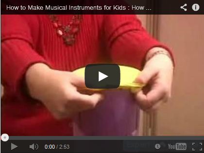 How to Make Musical Instruments for Kids : How to Make a Tom Tom Drum Using a Container & Balloons by expertvillage