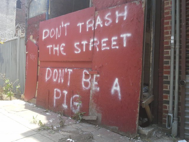 Dont trash the street, dont be a pig -Michael Jastremski for openphoto.net